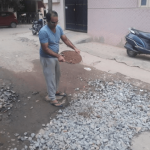 HSR residents fill potholes themselves! 15