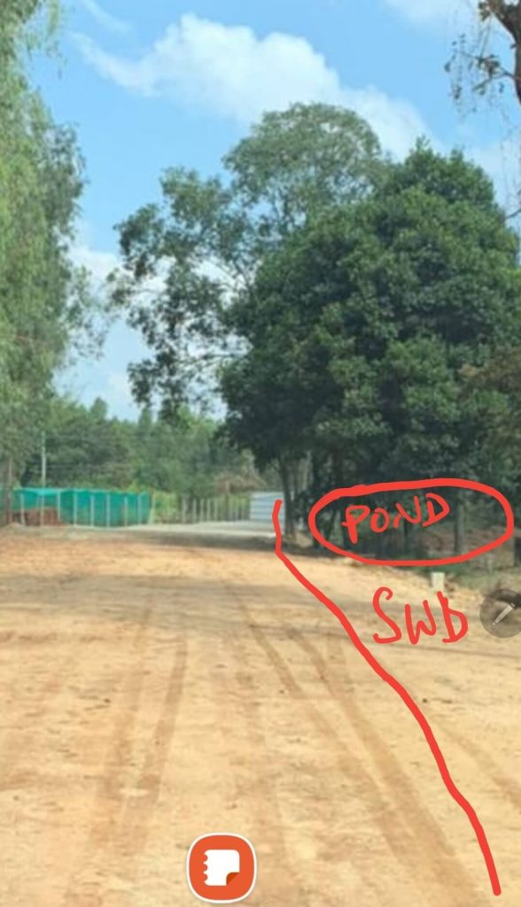 Pond and drain encroached to build private road in Anekal 4