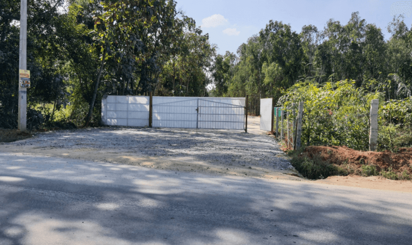 Pond and drain encroached to build private road in Anekal 5